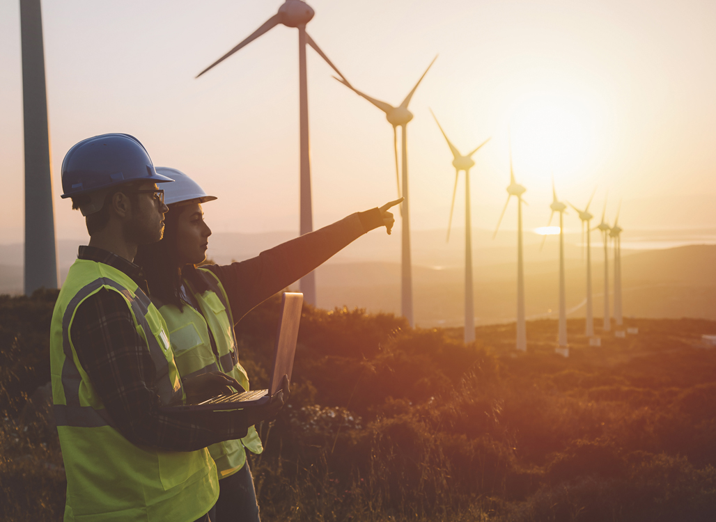 Windmills and construction workers